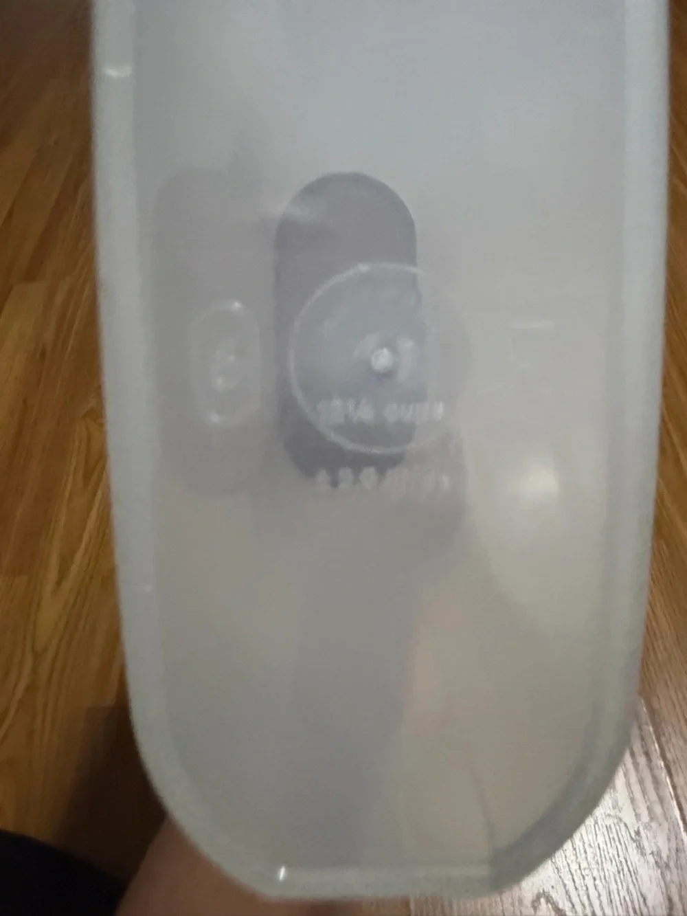 VTG Tupperware Modular Mates Oval 5 container with a brown seal lid.